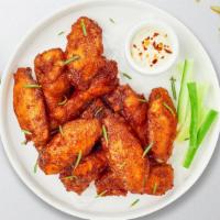 Classic Wings · Fresh chicken wings breaded and fried until golden brown. Served with a side of ranch or ble...
