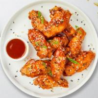 Oriental City Wings · Fresh chicken wings breaded, fried until golden brown, and tossed in sweet and sour sauce. S...