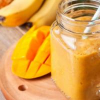 7 Smoothie · Smoothie made of fresh mangoes, pineapple, bananas, and almond milk.
