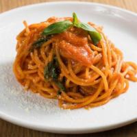 Spaghetti Pomodoro · san marzano tomatoes, basil, and parmigiano reggiano.