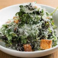 Kale Caesar · organic baby kale, roasted pine nuts, focaccia croutons, homemade caesar dressing