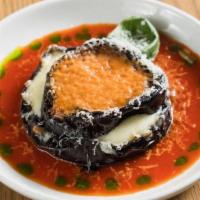 Eggplant Parm · gluten-free. roasted eggplant, mozzarella, basil, tomato sauce, parmigiano reggiano