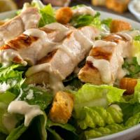 Grilled Chicken Caesar Salad · Fresh green salad prepared with Grilled chicken, cheese, romaine lettuce, carrots, grape tom...