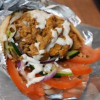 Chicken Gyro · Grilled chicken cut from the gyro wrapped in pita seasoned to perfection with your choice of...