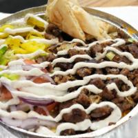 Lamb Platter · Grilled lamb cut from the gyro seasoned to perfection with your choice of toppings served ov...