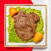 Tallarin Verde Con Bistec · Linguini, cooked in pesto sauce. Served with steak.