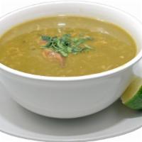 Aguadito De Pollo · Peruvian coriander based rice soup.