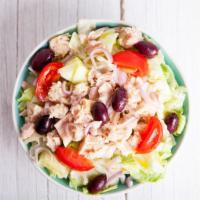 Tuna Salad  · Fresh tuna, romaine, olives, carrots, tomatoes, and cucumbers.