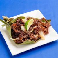 Vaca Frita · Shredded beef sauteed with onions, garlic, and lime