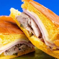 Cubano Sandwich · Ham, pork, Swiss cheese, pickle & mojo