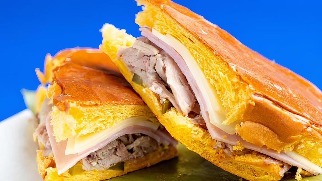 Cubano Sandwich · Ham, pork, Swiss cheese, pickle & mojo
