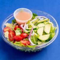 House Salad · Field greens with tomatoes, cucumbers, and house vinaigrette