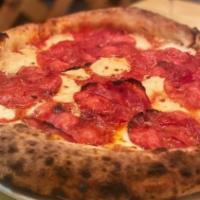 Peperoncino Pizza · Tomato sauce, mozzarella and spicy salami.