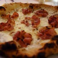 Prosciutto E Funghi Pizza · Tomato sauce, mozzarella, mushrooms and ham.