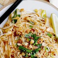 Pad Thai · Famous Thai dish made with rice, noodles, egg, scallions, bean sprouts, cilantro and delicio...