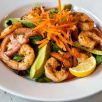 Shrimp And Avocado Salad · Cajun Grilled Shrimp, Mesclun Greens, Avocado, Carrots, Tomato, Lemon Vinaigrette. **GF**