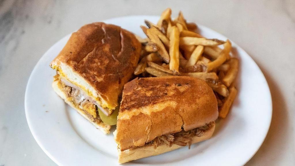 Cuban Sandwich · House Slow Roasted Pulled Pork, Ham, Swiss, Pickles & Mustard on Buttery Pressed Club Roll, Side of Fries or Salad