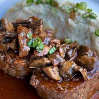 Meatloaf · Topped with a Mushroom Gravy with a Side of Mashed Potatoes