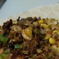 Mexi-Tarian Burrito · Veggie mix, brown rice, black beans, pico de gallo, vegan tomato cream. Side of green sauce....