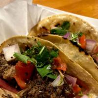 Jerk Chicken Tacos · 3 Jerk Chicken Tacos with pico de gallo, a blend of cheese, chipotle mayo and pickled red on...