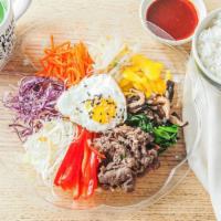 Vegetable Bi-Bim-Bab (비빕밥) · Assortment of lightly sauteed vegetables, fried egg  and white rice. Served with spicy Bibim...