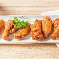 Spicy Chicken Wing · 6 fried chicken wings covered with Korean style sweet and spicy sauce.