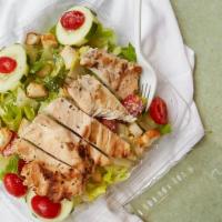 Hot Grilled Chicken Salad · Romaine lettuce, cucumbers, tomatoes, croutons, Parmesan cheese.