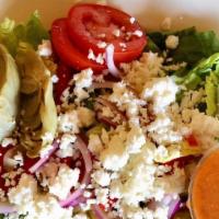 Greek Salad · Romaine lettuce, feta cheese, black olives, tomatoes, cucumbers, red onion.