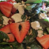 Spinach Salad · Spinach, arugula, cucumbers, tomato, feta cheese, sundried tomato, raisins