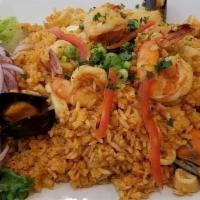 Arroz Con Mariscos · Seafood with rice