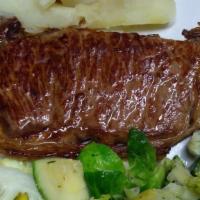 Ny Sirloin Steak · Served with vegetables and cassava