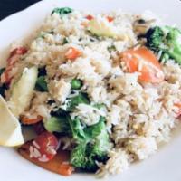 Fried Rice · Traditional thai-style fried rice with choice of meat, Chinese broccoli, onion, pea and carr...