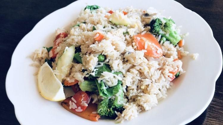 Fried Rice · Traditional thai-style fried rice with choice of meat, Chinese broccoli, onion, pea and carrot, and egg in a tasty sauce.
