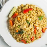 Green Curry Fried Rice (Spicy) · Fried rice in a spicy green curry sauce sautéed with pea and carrot, bell peppers, basil, an...