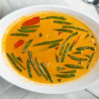 Gang Panang (Spicy) · Choice of meat sautéed with string beans, bell pepper, lime leaves, and coconut milk in pana...
