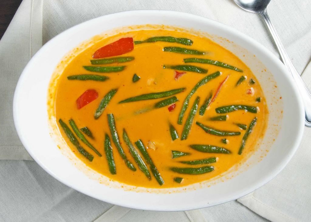 Gang Panang (Spicy) · Choice of meat sautéed with string beans, bell pepper, lime leaves, and coconut milk in panang curry paste.