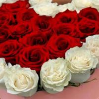 Beating Heart · Two toned heart shaped rose arrangement with 20-25 fresh roses.