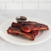 Barbecued Spare Ribs · First marinated overnight and then hung in our special oven to roast.  Our ribs are again ma...