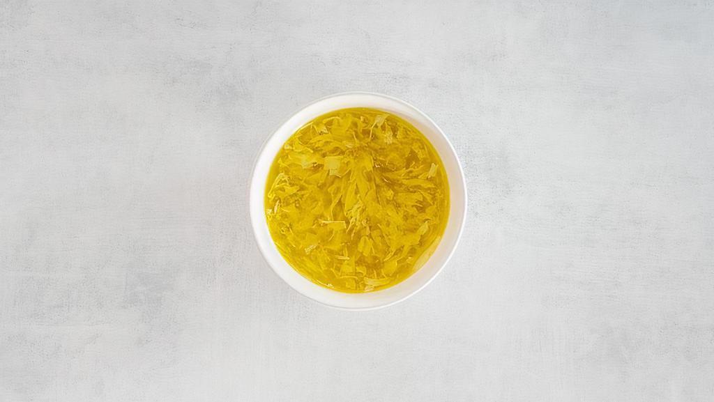 Egg Drop Soup · A signature soup made with quickly whipped eggs and lightly thickened stock.
