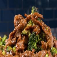 Beef With Broccoli (Large) · Sliced beef and broccoli crowns wok tossed in our classic brown sauce
