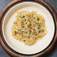 Cacio E Pepe Pasta · (Vegetarian) Fresh spaghetti cooked in a Parmigiano-Reggiano based sauce made with salt and ...