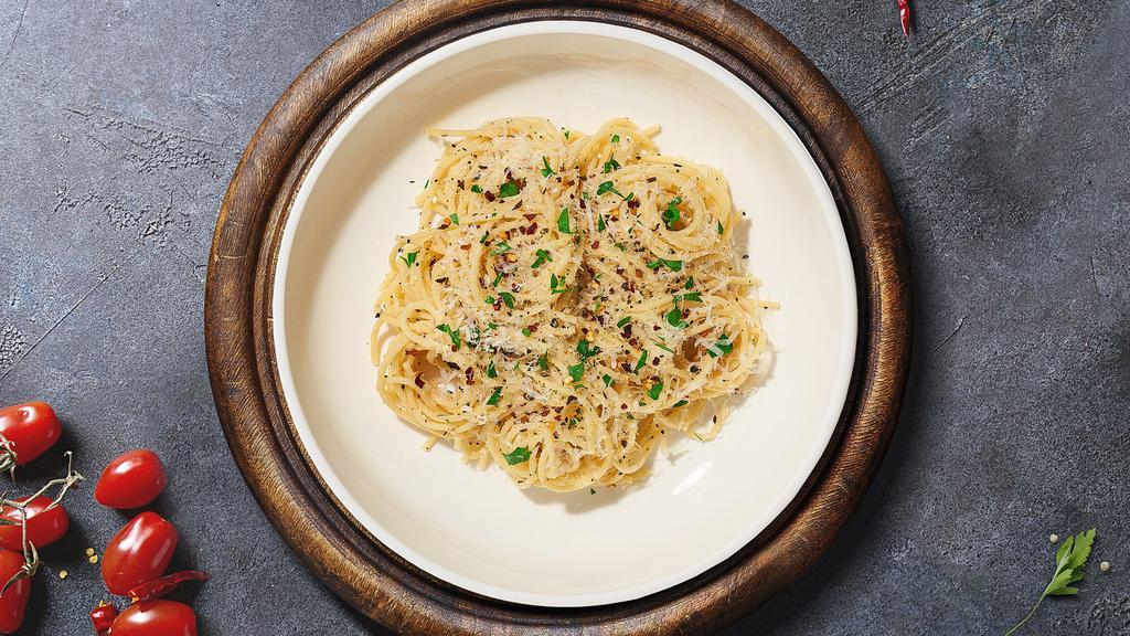 Cacio E Pepe Pasta · (Vegetarian) Fresh spaghetti cooked in a Parmigiano-Reggiano based sauce made with salt and a generous offering of ground black pepper served with your choice of pasta.