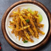 Cajun Fries · (Vegetarian) Idaho potato fries cooked until golden brown and garnished with salt and cajun ...