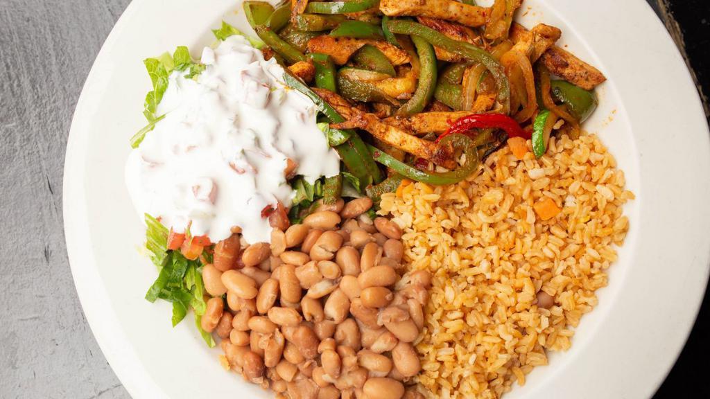 Grilled Chicken Fajita Platter · Served with 4 flour tortillas, Mexican rice, pinto beans, pico de gallo, Romaine lettuce, and sour cream 
Spicy upon request