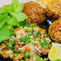 Namkhao , Crunchy Fried Rice · Deep fried rice with pork, cilantro, onions, fresh lime juice, thai seasoning, and dry chili...
