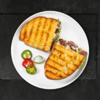 Put In Panini · Roast beef, muenster cheese, caramelized onions, lettuce, tomatoes and Russian dressing.