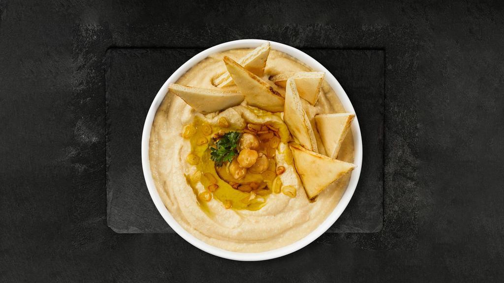 Humm For Hummus · A mixture of mashed garbanzo beans, lemon juice and tahini, and garlic served with pita bread.