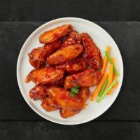 Hot Shot Buffalo Wings · 6 Pcs Fresh chicken wings breaded, fried until golden brown, and tossed in hot buffalo sauce.