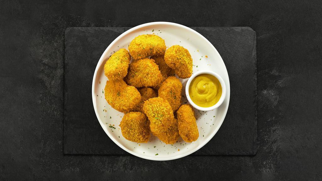 Naughty Nugget · Bite sized nuggets of chicken breaded and fried until golden brown. Served with your choice of sauce.