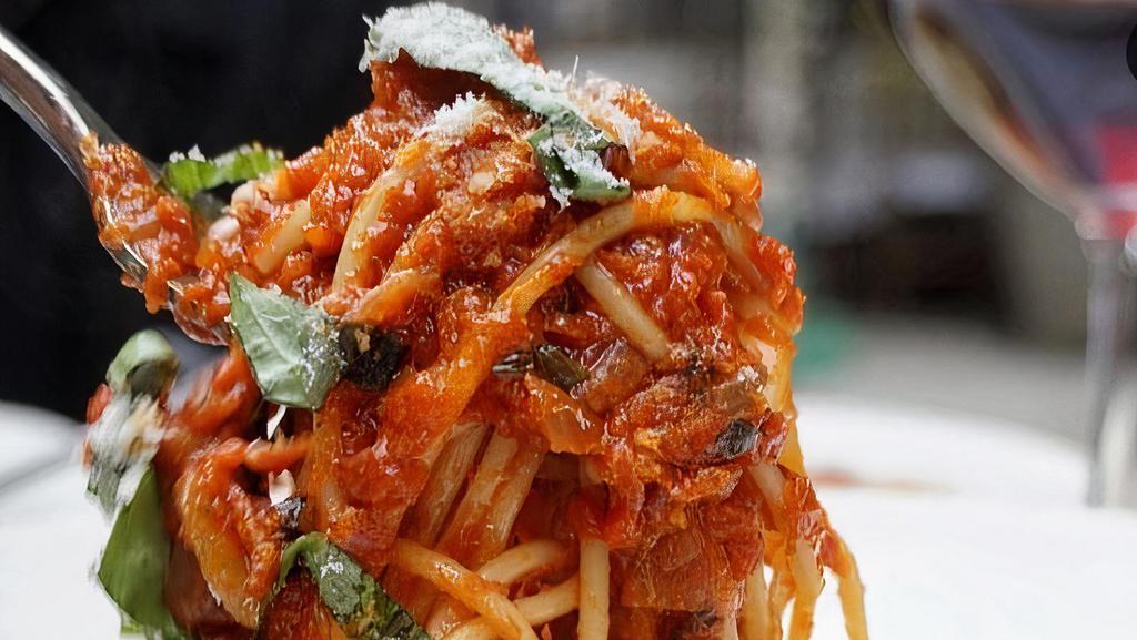 Spaghettini · Tomato basil sauce.